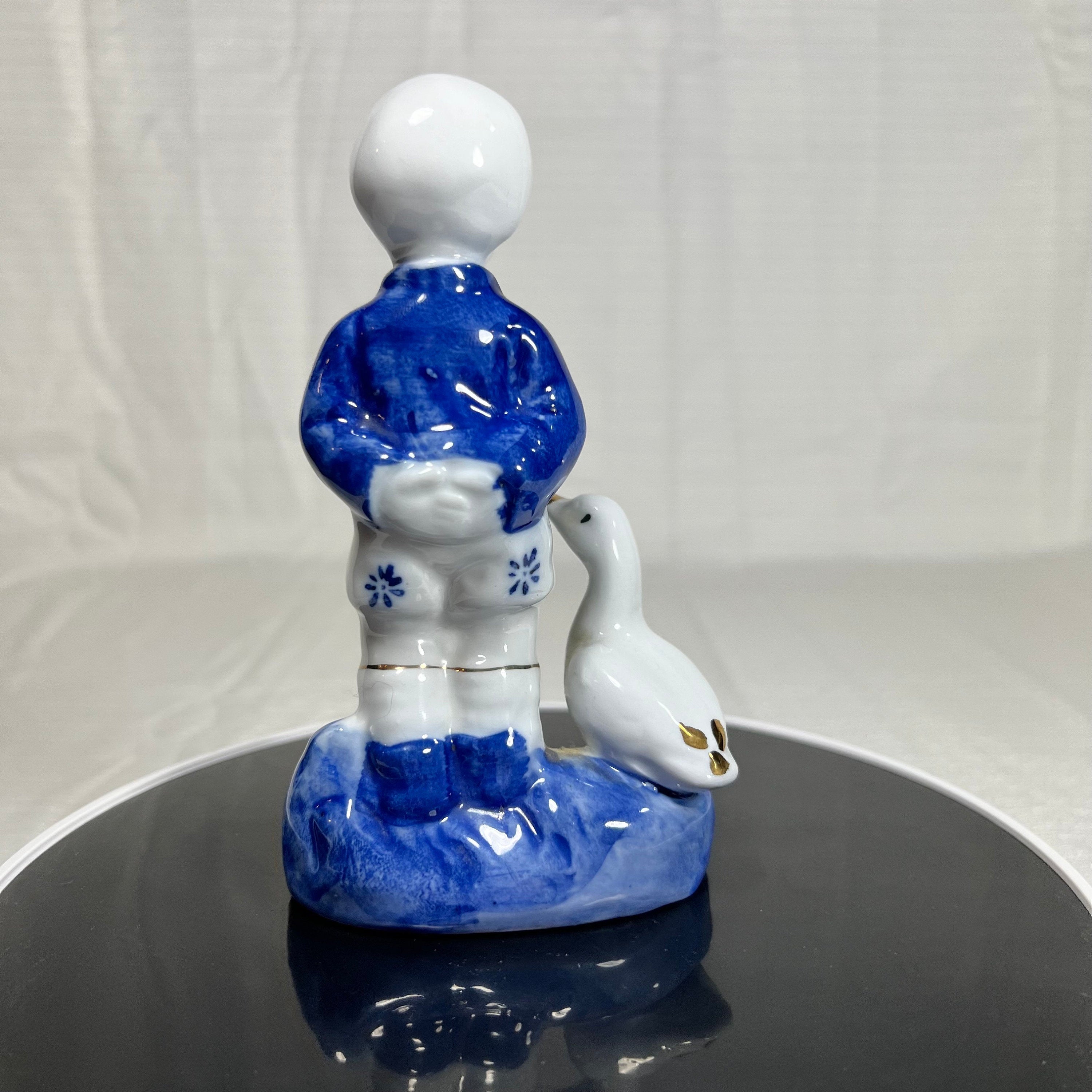 Blue and White Boy and His Goose Figurine