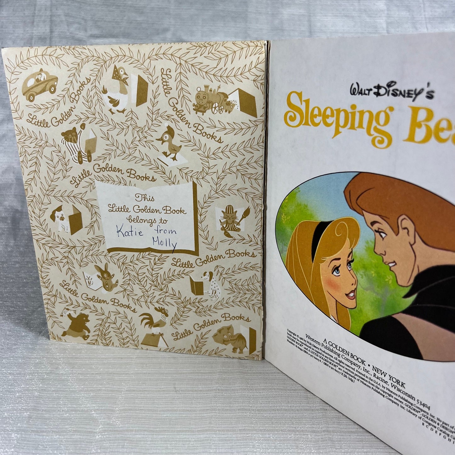 a Little Golden Book Walt Disney’s Sleeping Beauty - broken binding, writing on name plate