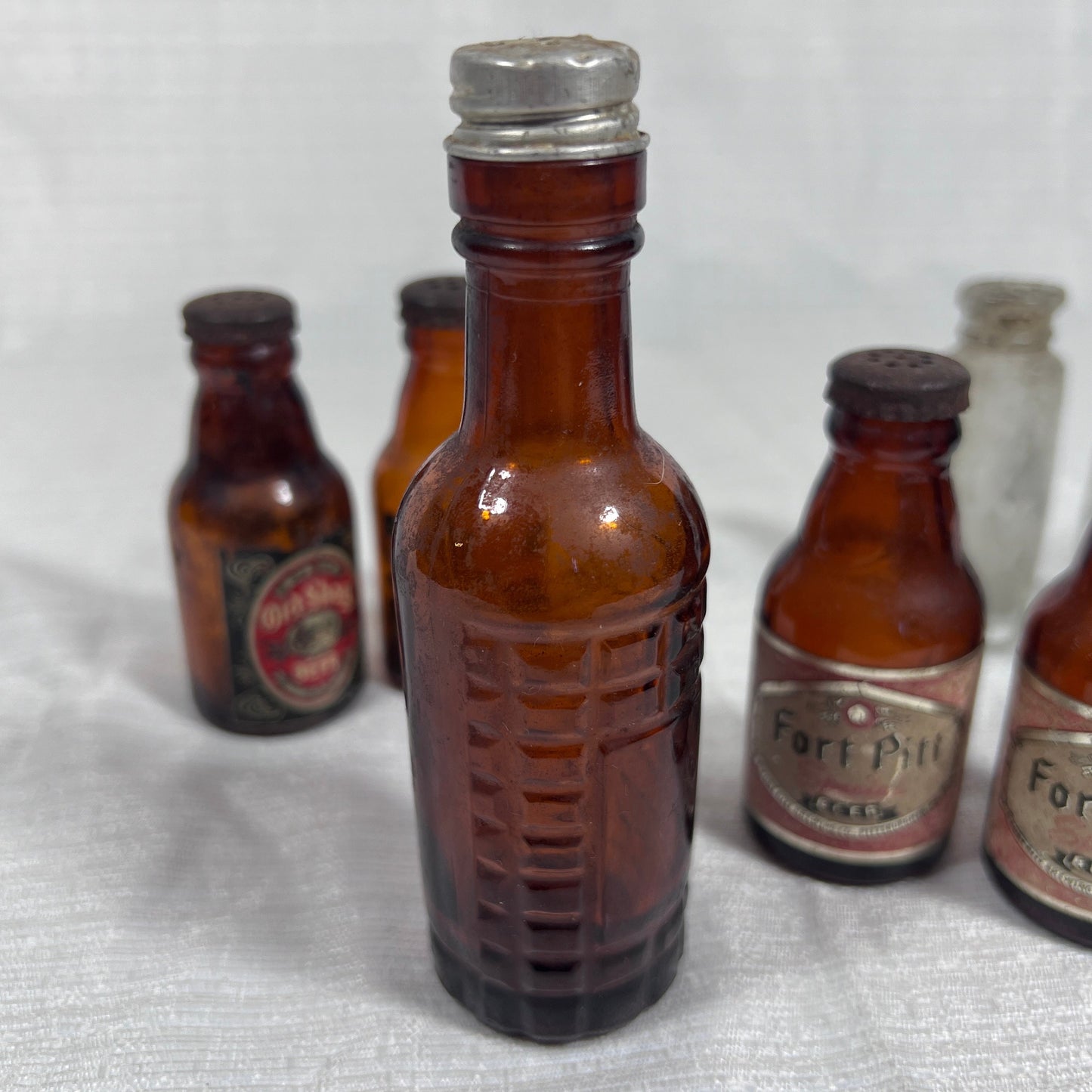 Lot of old Salt and Pepper Shakers and Glass Bottles