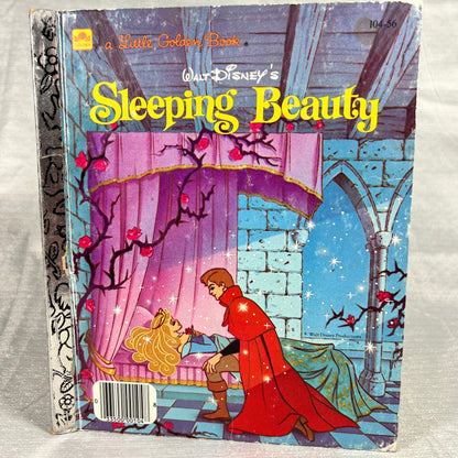 a Little Golden Book Walt Disney’s Sleeping Beauty - broken binding, writing on name plate